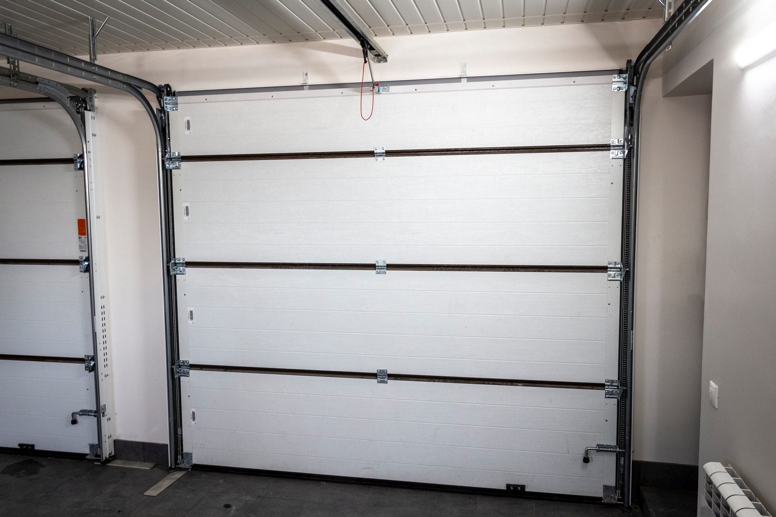 Inside view of a sectional garage door with side tracks